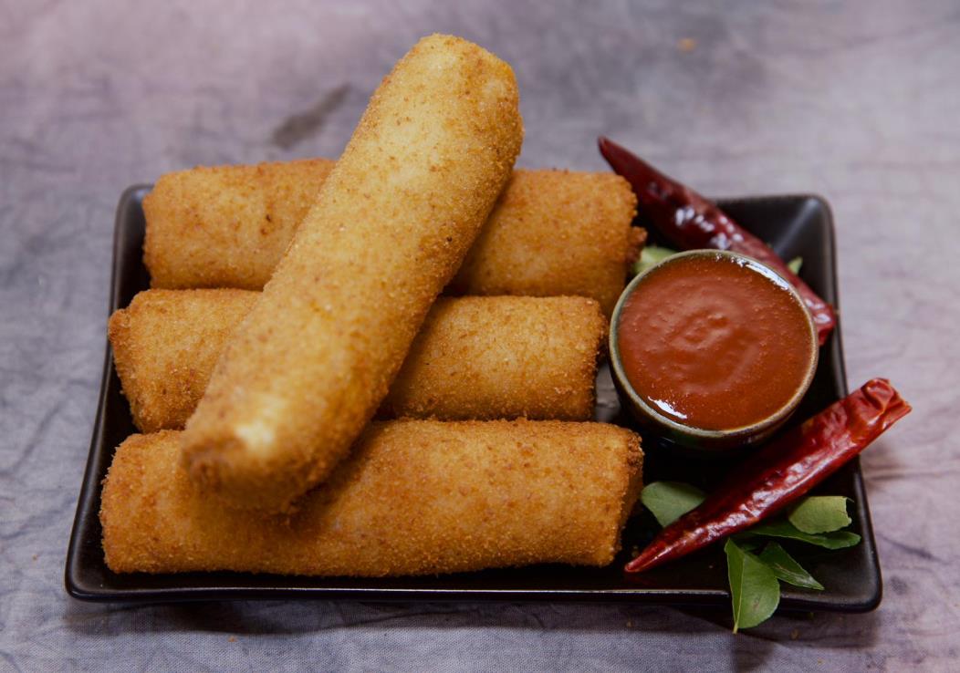 Breaded chicken rolls filled with chicken and potato curry