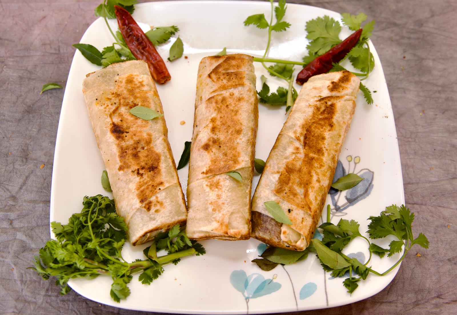 Griddled mutton rotti, folded and cut into pieces