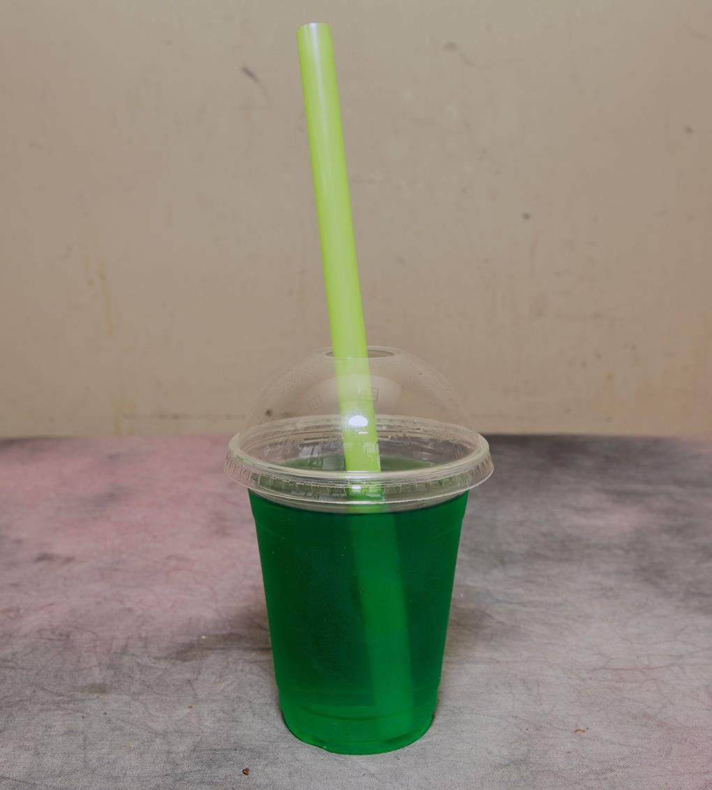 Neli crush, a tart nelli fruit drink over ice