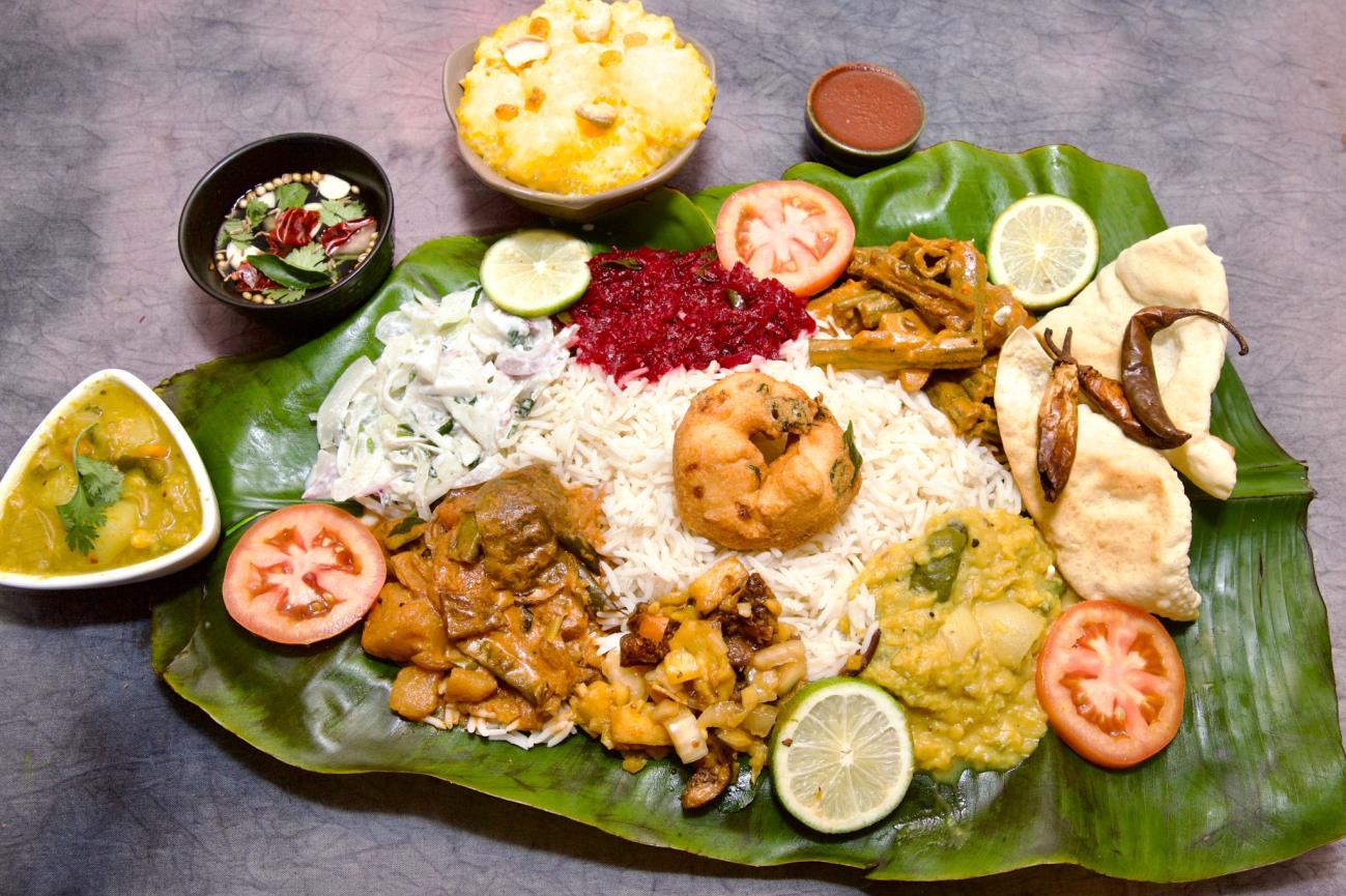 White or brown rice served with five or six different curries