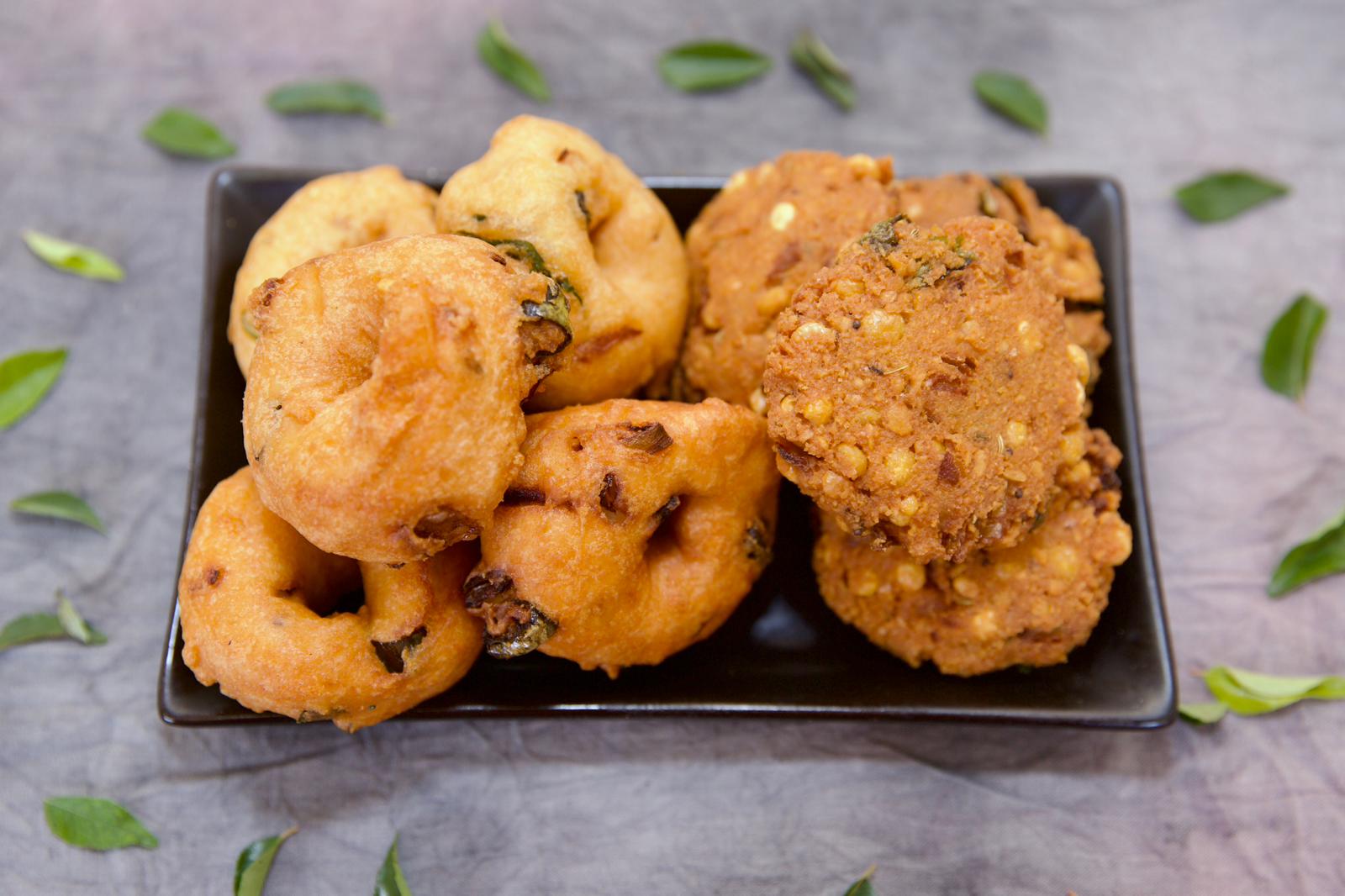 Medhu vada and masala vada fried fresh from the counter